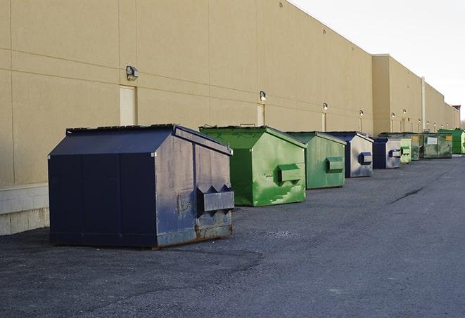 an empty dumpster ready for use at a construction site in Blacksburg